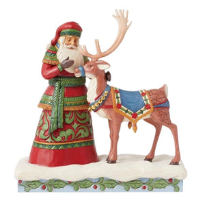 Santa With Deer Figurine