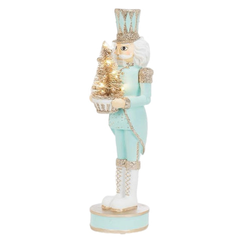 Light Blue Nutcracker Holding Tree Figurine