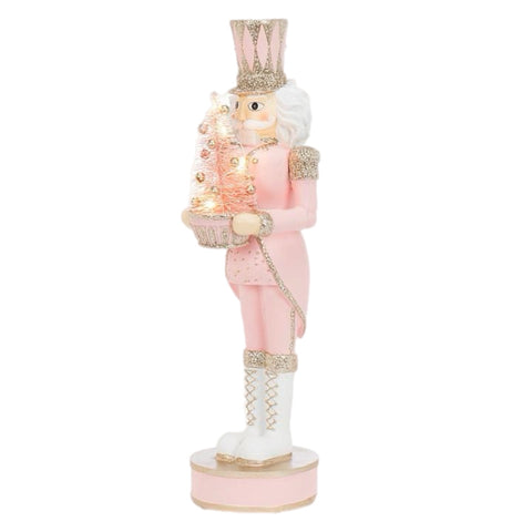 Light Pink Nutcracker Holding Tree Figurine