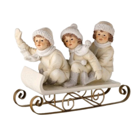 Children On Sled Figurine