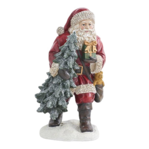 Santa Carrying Tree Figurine