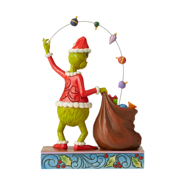 Grinch Juggling Gifts Into Bag Figurine