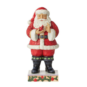 Santa Holding Cardinal Figurine